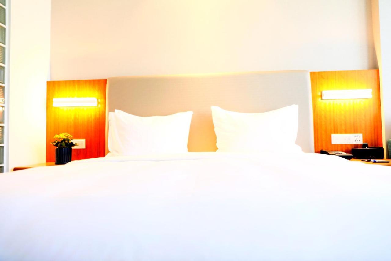 Holiday Inn Express Luoyang Xiyuan Buitenkant foto